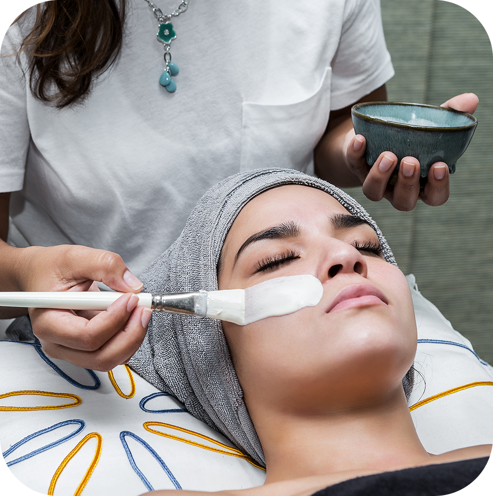 Client receiving a facial mask at Ashtamudi Beauty Salon
